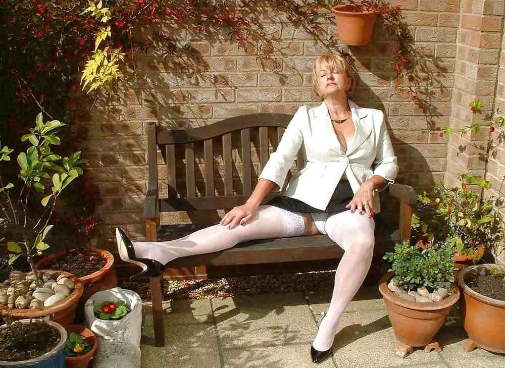 13P Hot granny stripping in backyard