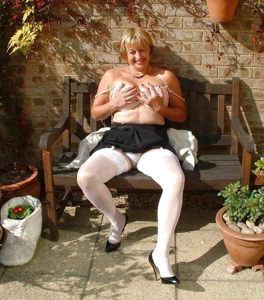 13P Hot granny stripping in backyard