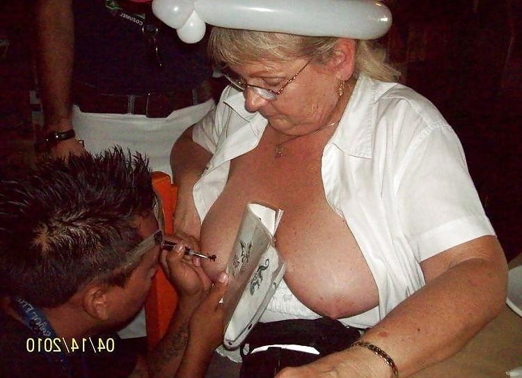 7P D.r.u.n.k granny gets a tattoo on her tit