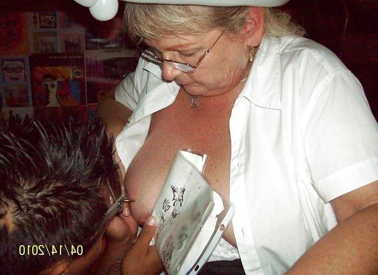 7P D.r.u.n.k granny gets a tattoo on her tit
