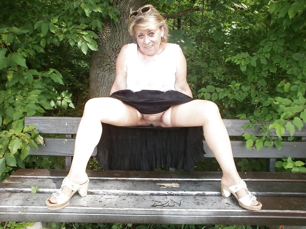 20P Hairy granny enjoying herself outdoors