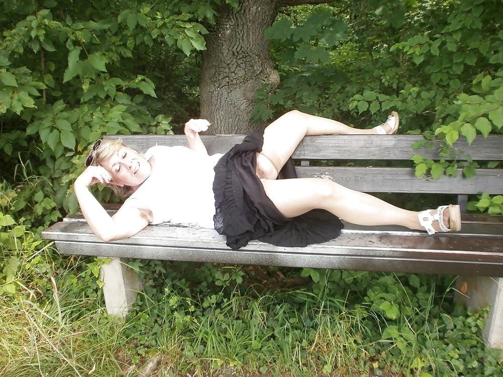 20P Hairy granny enjoying herself outdoors