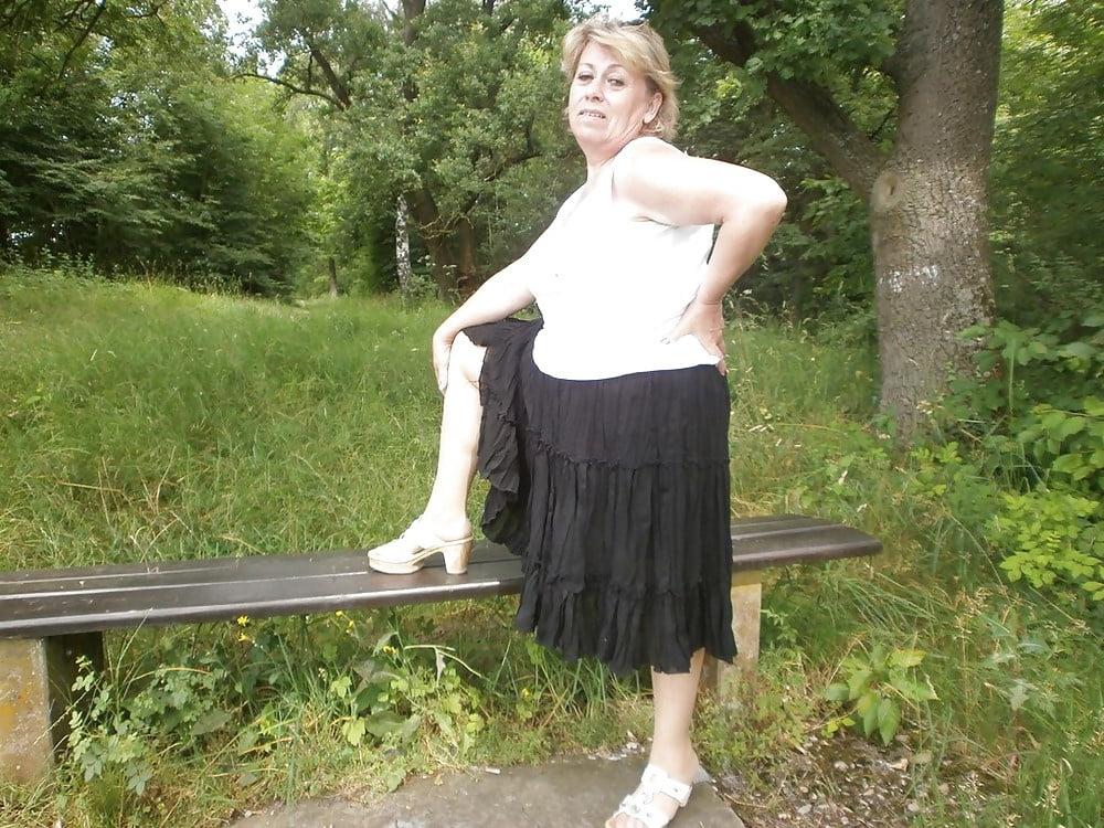 20P Hairy granny enjoying herself outdoors