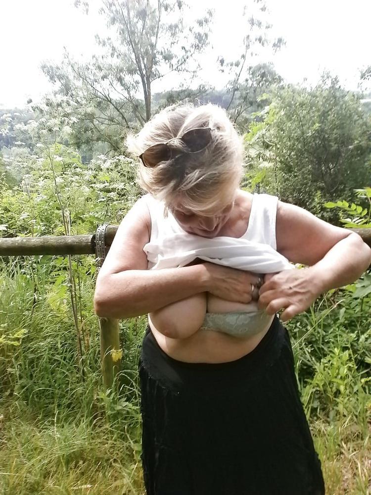 20P Hairy granny enjoying herself outdoors