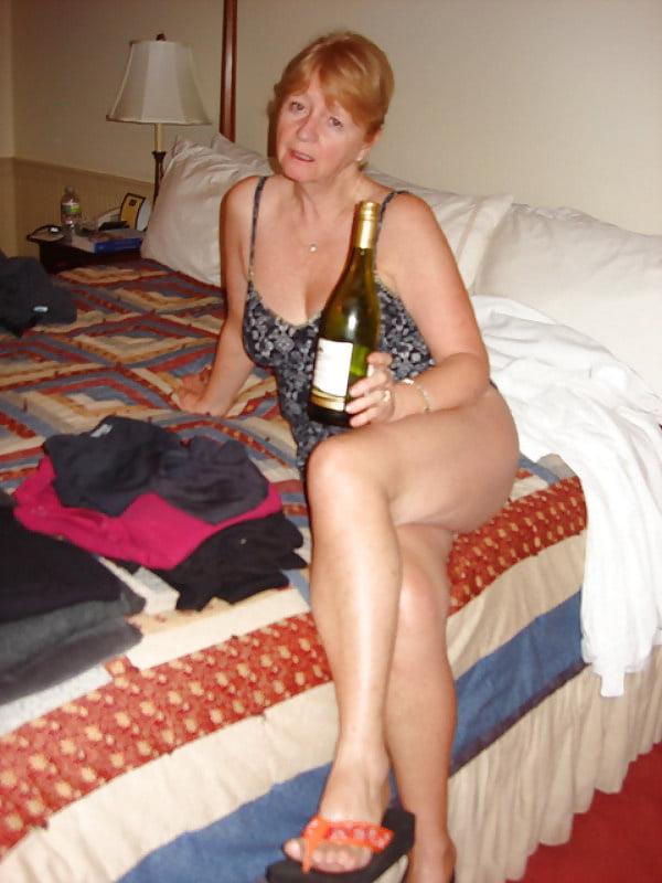 20P Hot granny drinking&amp;laying on the bed
