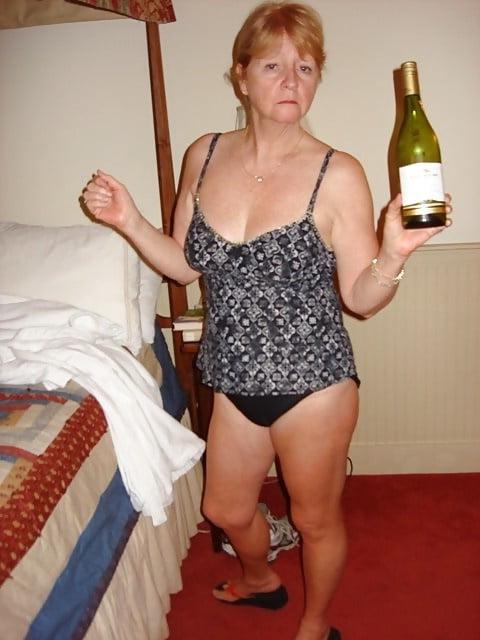 20P Hot granny drinking&amp;laying on the bed
