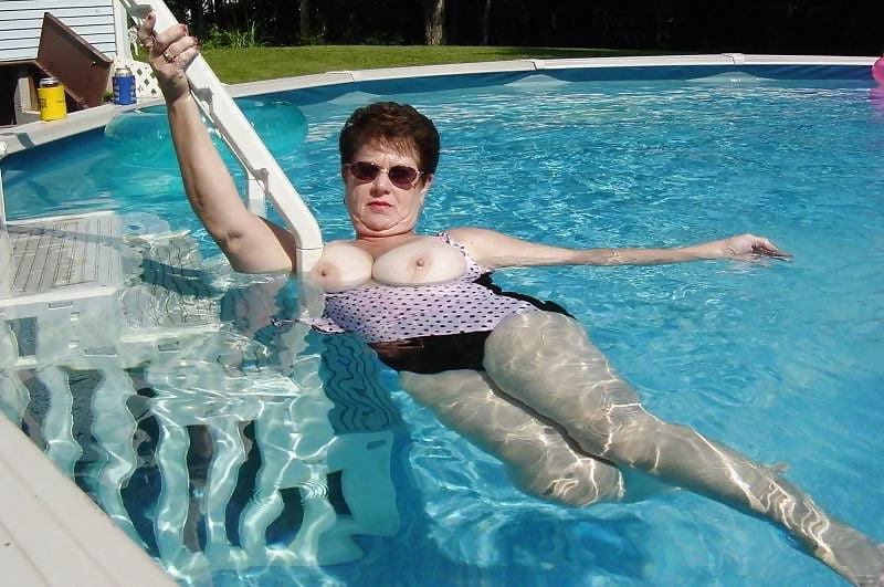 25P Sexy short-haired granny with big tits