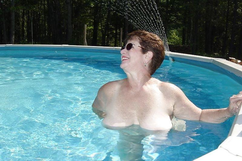 25P Sexy short-haired granny with big tits