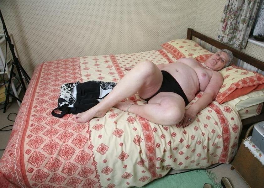 25P Plump grey haired granny undressing