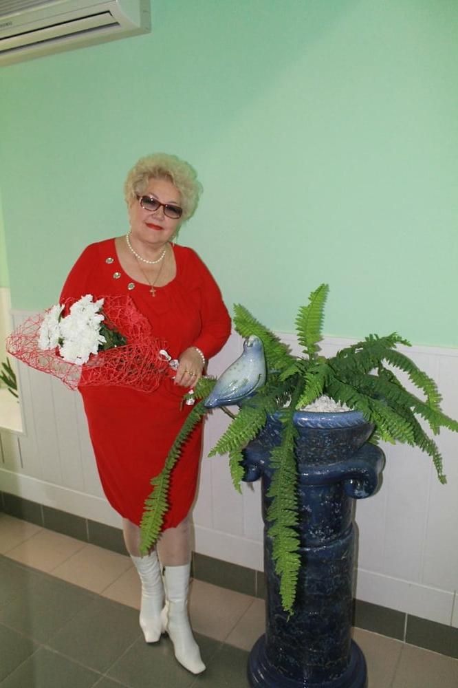 20P Beautiful blonde non-nude Russian granny