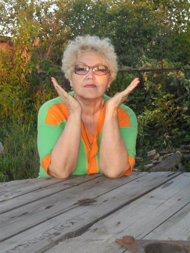 20P Beautiful blonde non-nude Russian granny