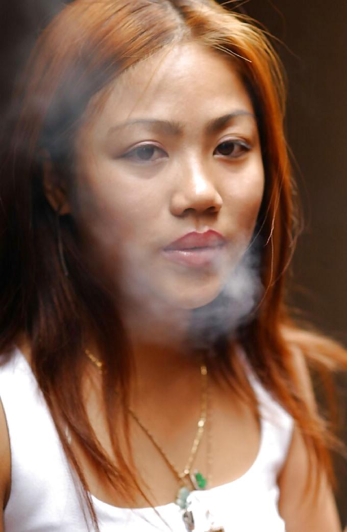 8P Smoking 005 - Thai Lady Candids (maybe)