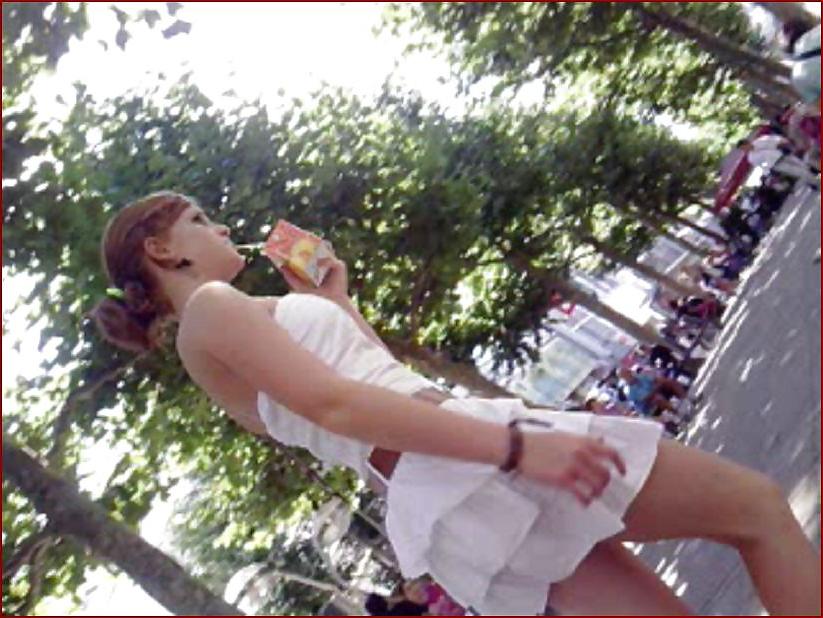 21P Teen upskirt with shaved pussy in hot white tanga