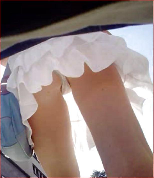21P Teen upskirt with shaved pussy in hot white tanga