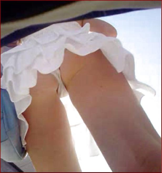 21P Teen upskirt with shaved pussy in hot white tanga