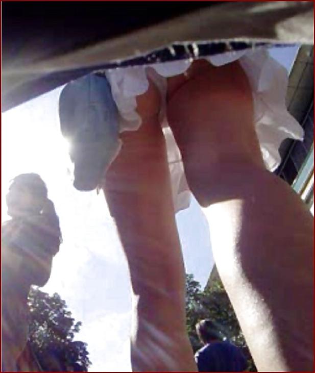 21P Teen upskirt with shaved pussy in hot white tanga