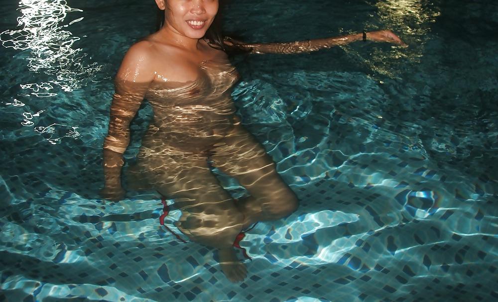 17P Sexy coed nude at the beach pool