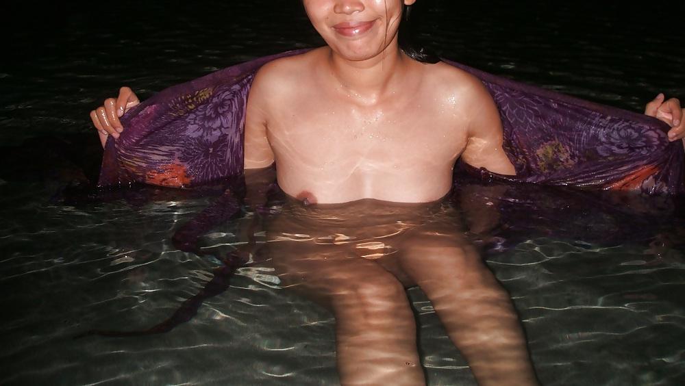 17P Sexy coed nude at the beach pool