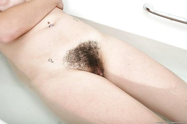 15P Raven Khyla shows her hairy pussy