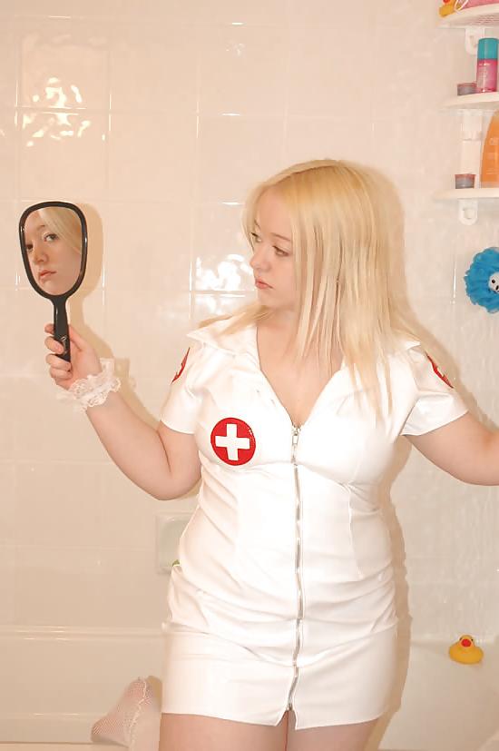 25P Chubby blonde posing as a nurse