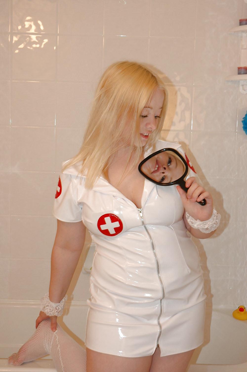 25P Chubby blonde posing as a nurse