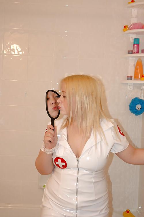25P Chubby blonde posing as a nurse