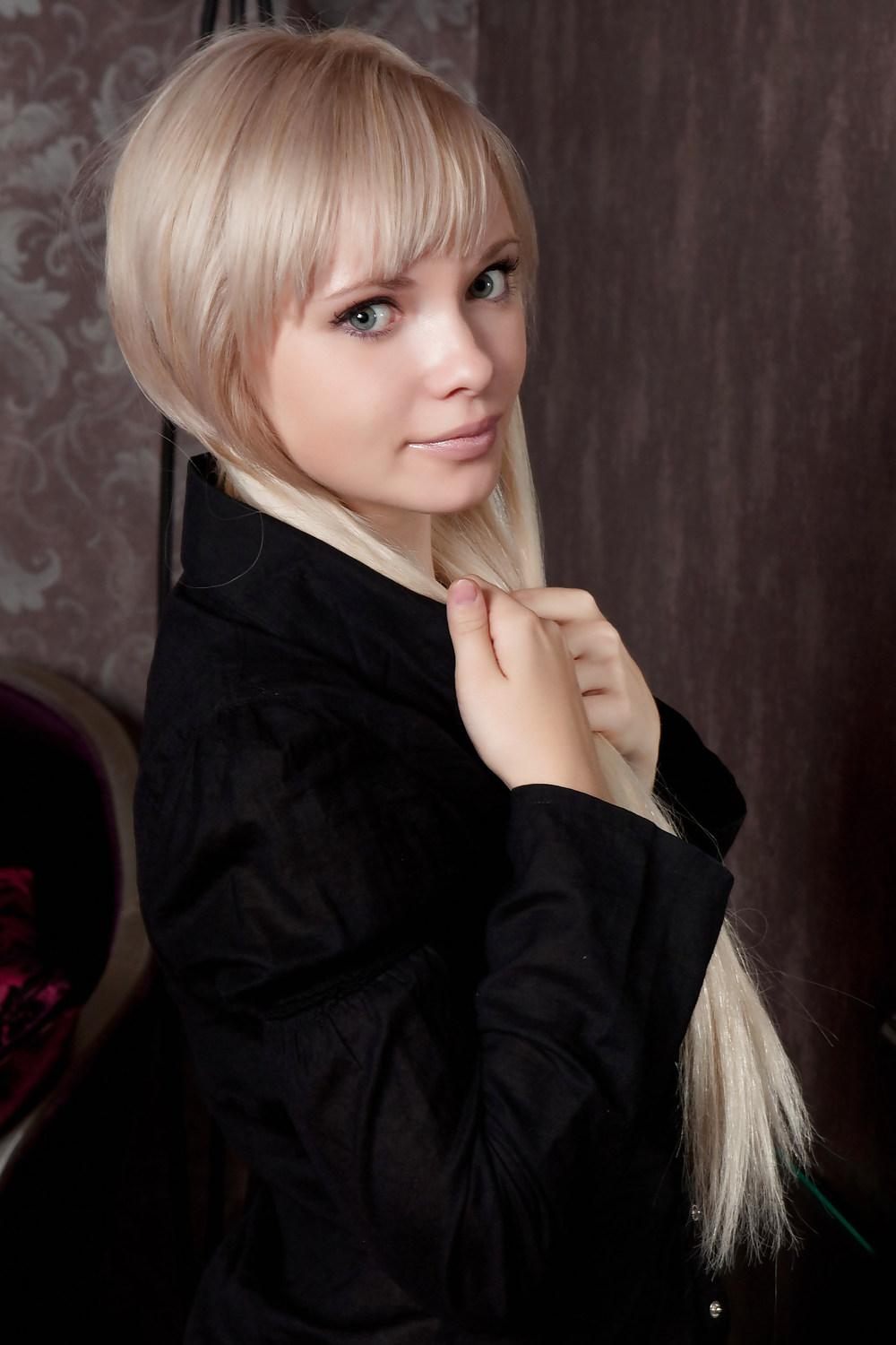 20P Beautyful blonde teen Freeona in black stockings