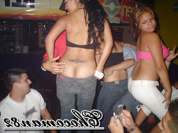 10P The girls in the club showing her ass and tits