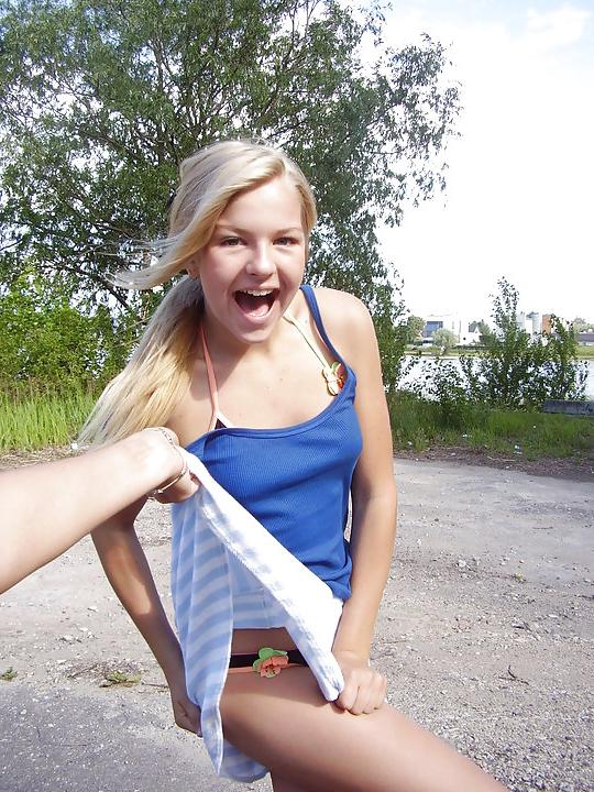 19P Girls pulling friends skirts up