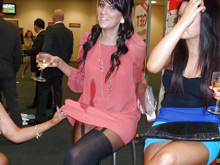 19P Girls pulling friends skirts up