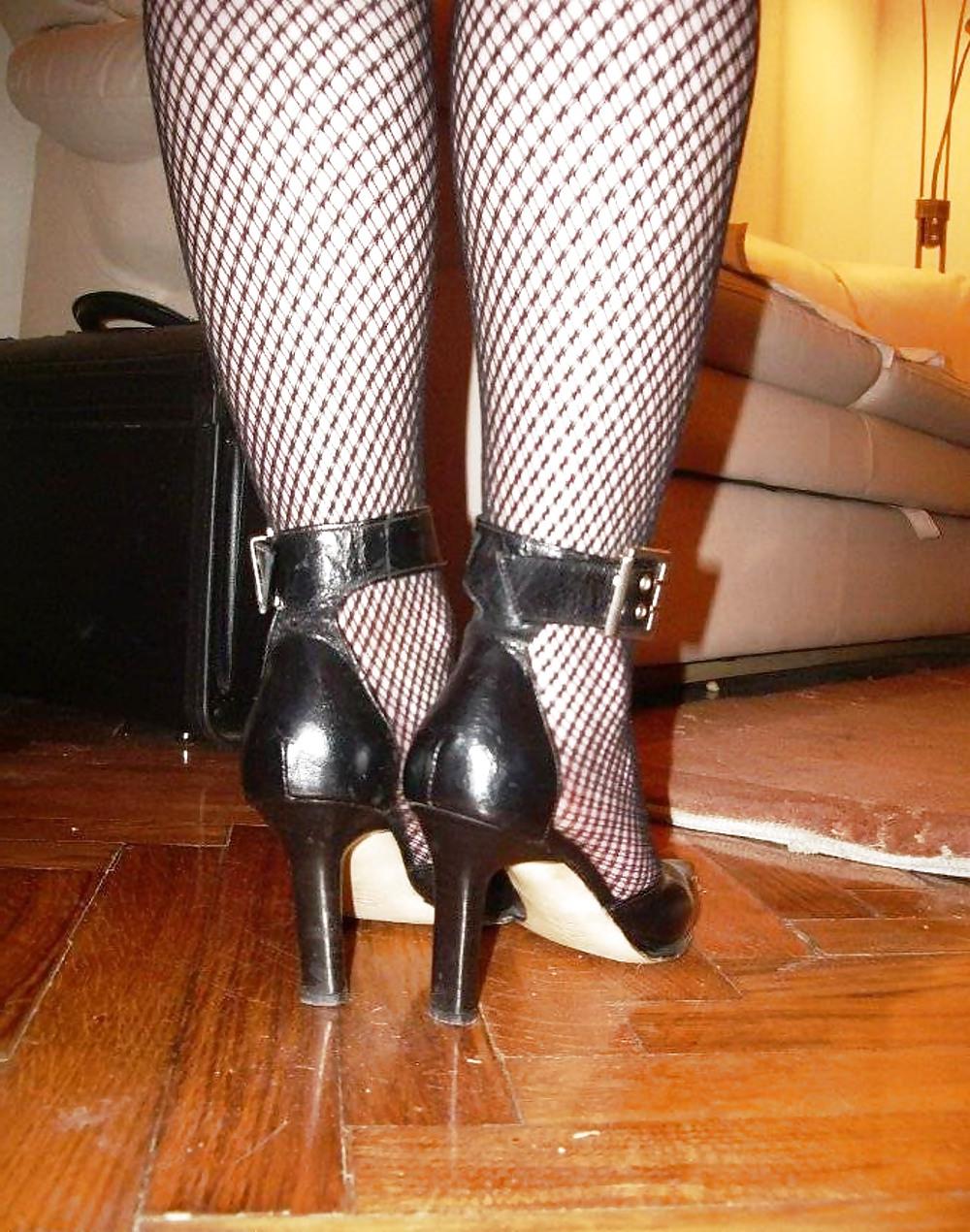 10P My greek wife with black fishnet stockings.