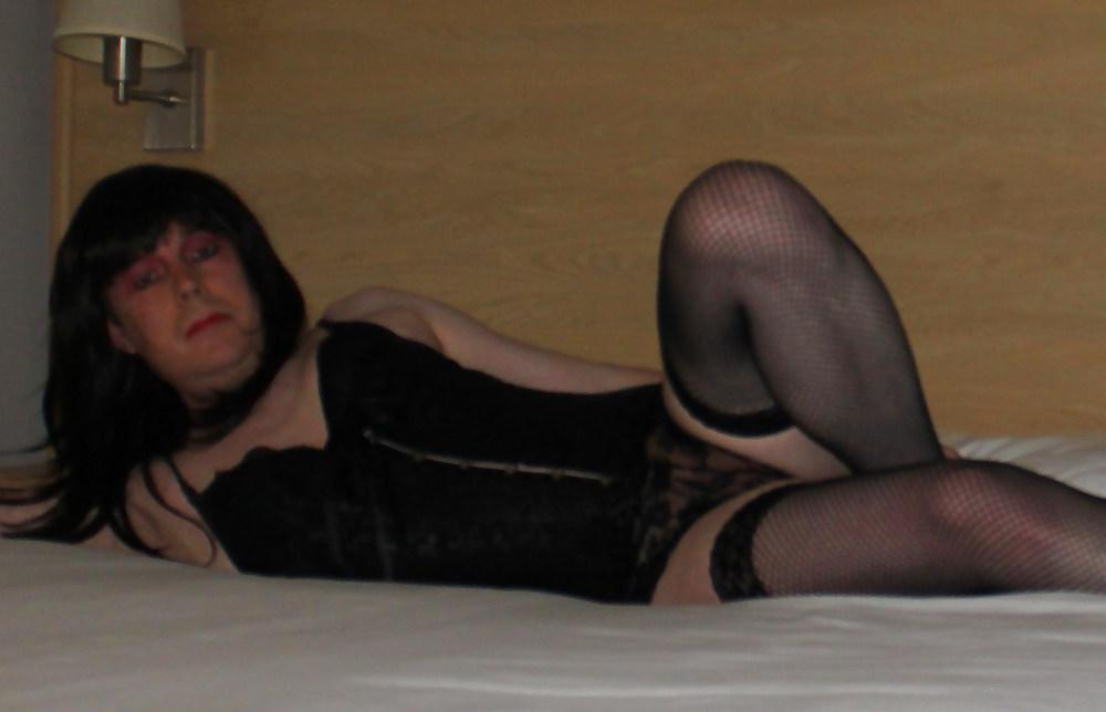 14P Slut Emma in black fishnet stockings exposing her cock
