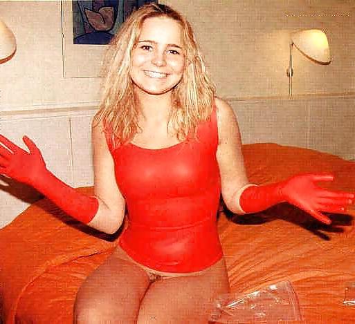 16P Cute blonde Gitte posing and fingering on her bed
