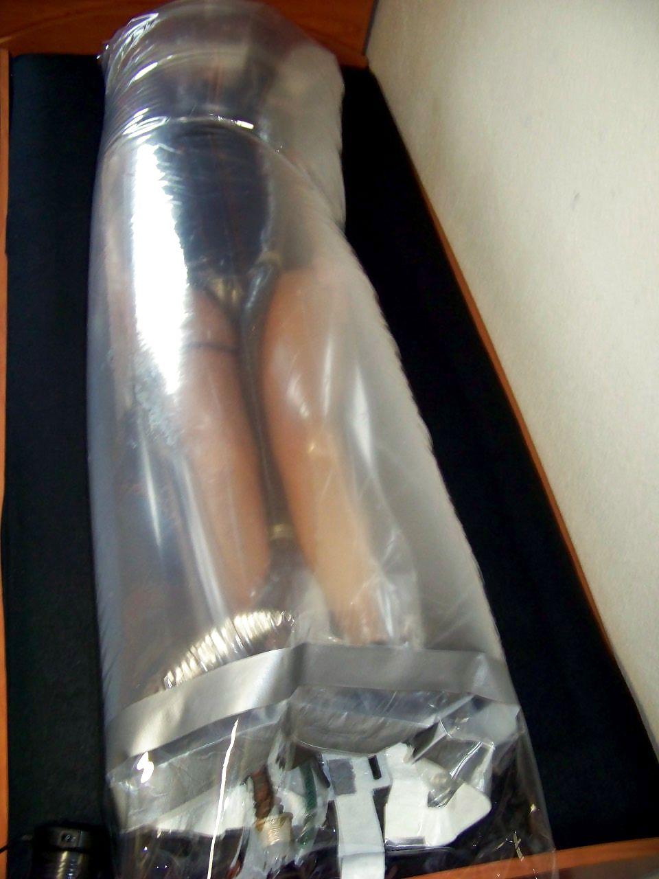 7P My wife in the inflatable bondage bag