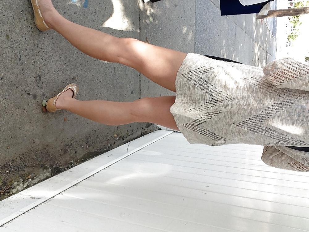 4P White girl's legs at bus stop