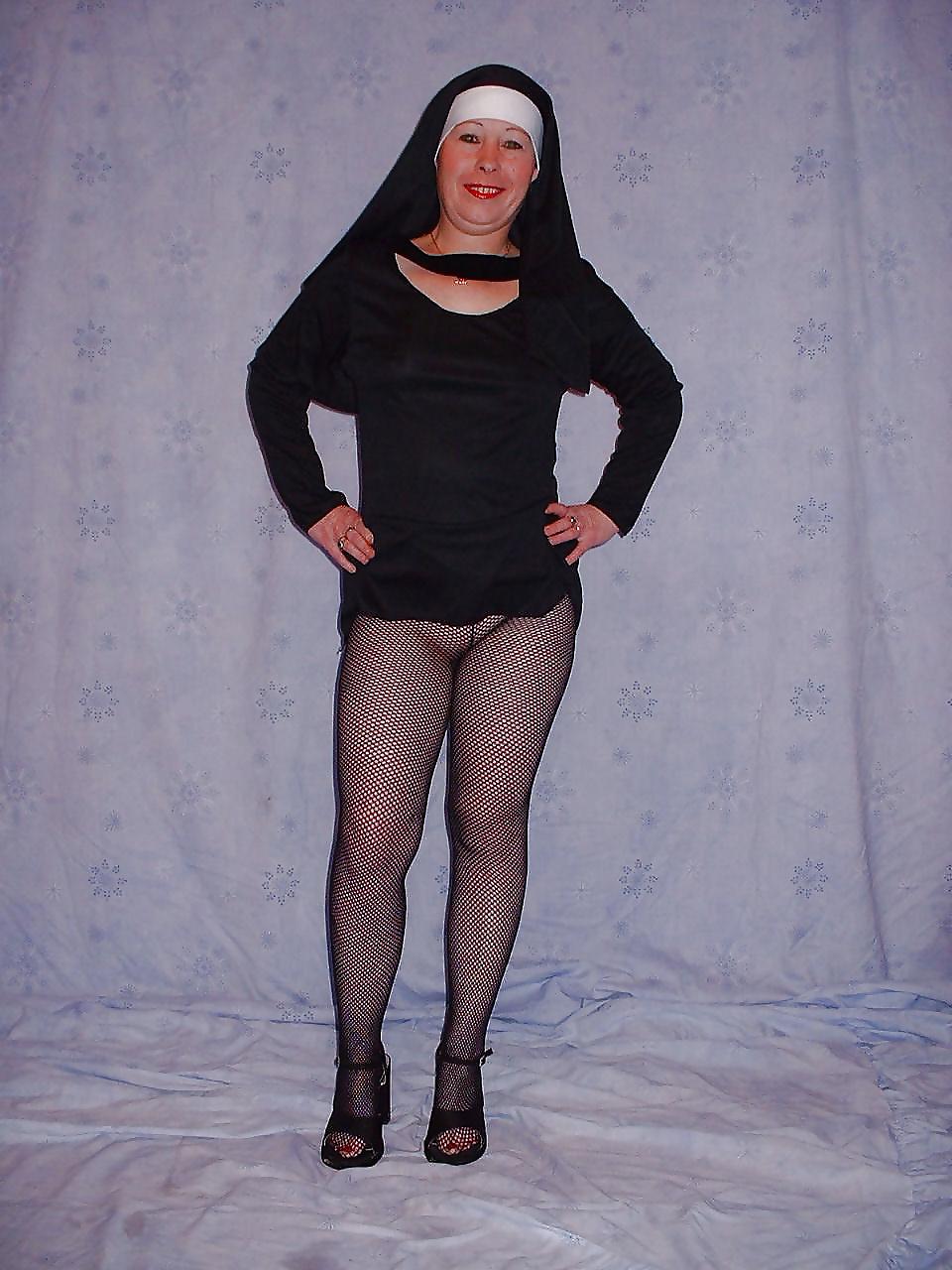 12P Mature nun in fishnet pantyhose