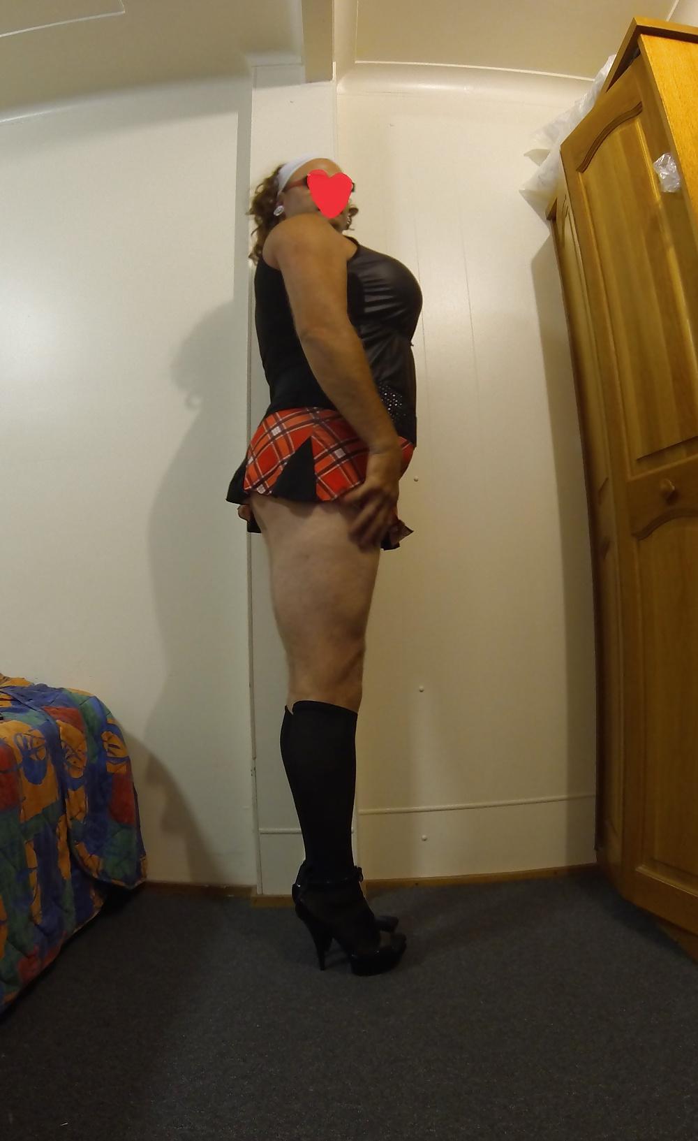 10P Big Tits CD Roxxi in plaid skirt platforms and latex top