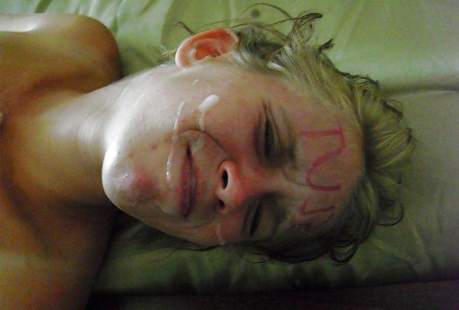 7P Women receiving a cum facial while as  part of BDSM
