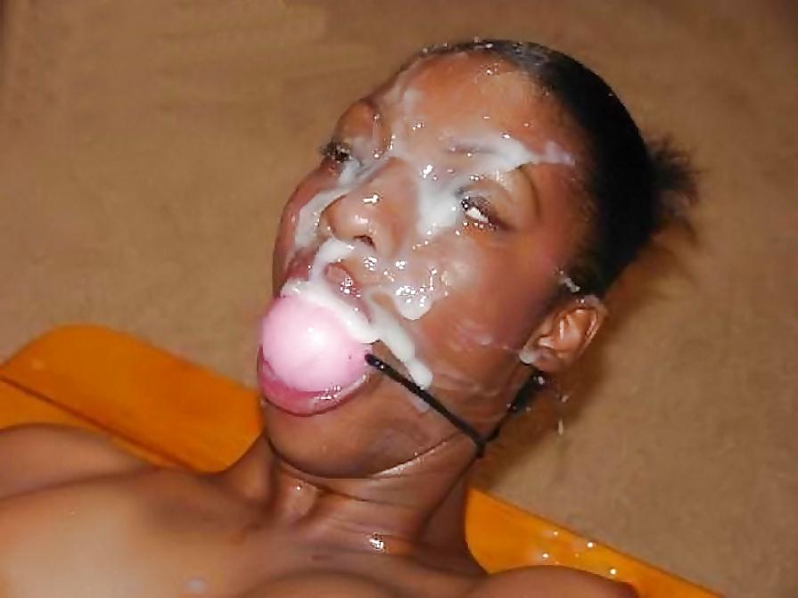 7P Women receiving a cum facial while as  part of BDSM