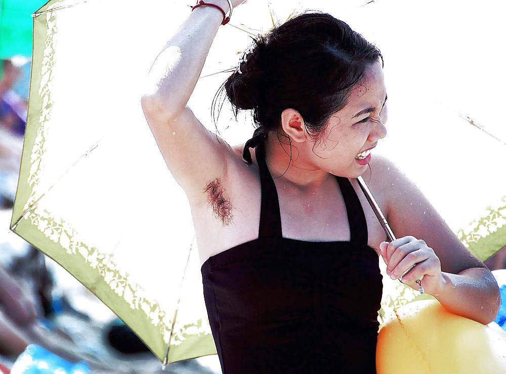 23P Asians girls showing hairy armpits