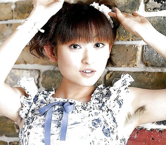 23P Asians girls showing hairy armpits