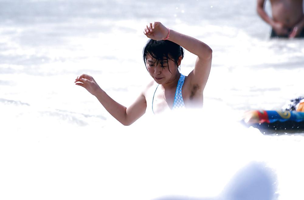 23P Asians girls showing hairy armpits