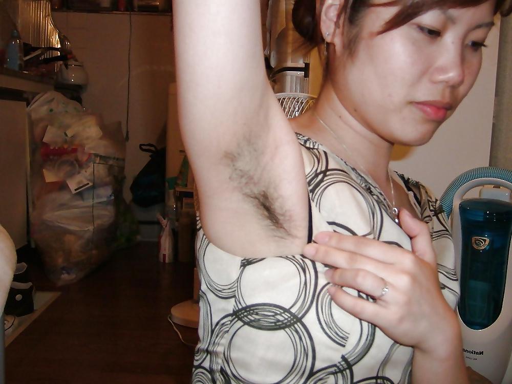 23P Asians girls showing hairy armpits