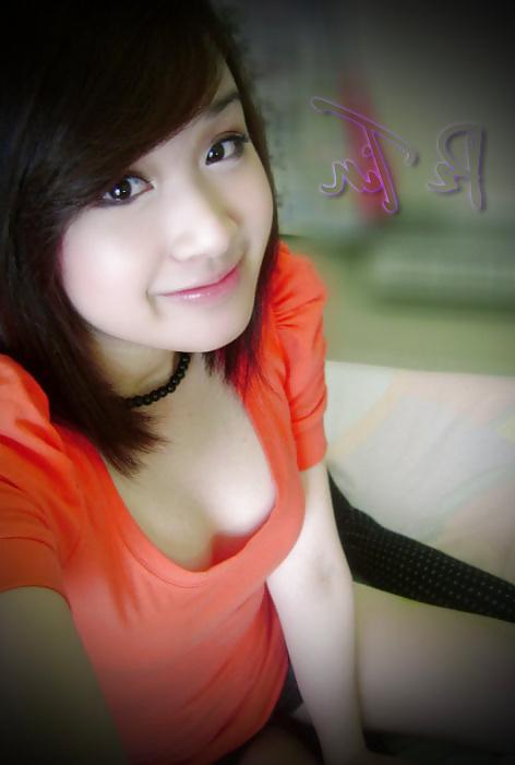 6P Pe Tin Cute Girl Viet Nam in Orange Shirt 