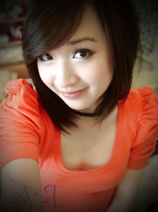 6P Pe Tin Cute Girl Viet Nam in Orange Shirt 