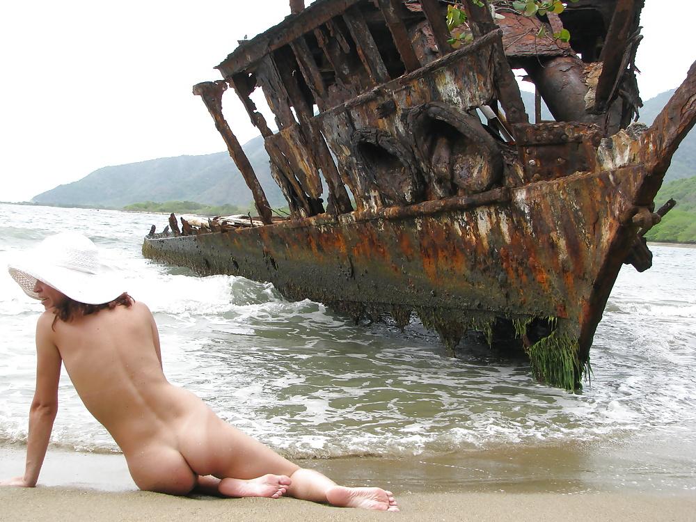 4P Sexy latin MILF posing in the beach