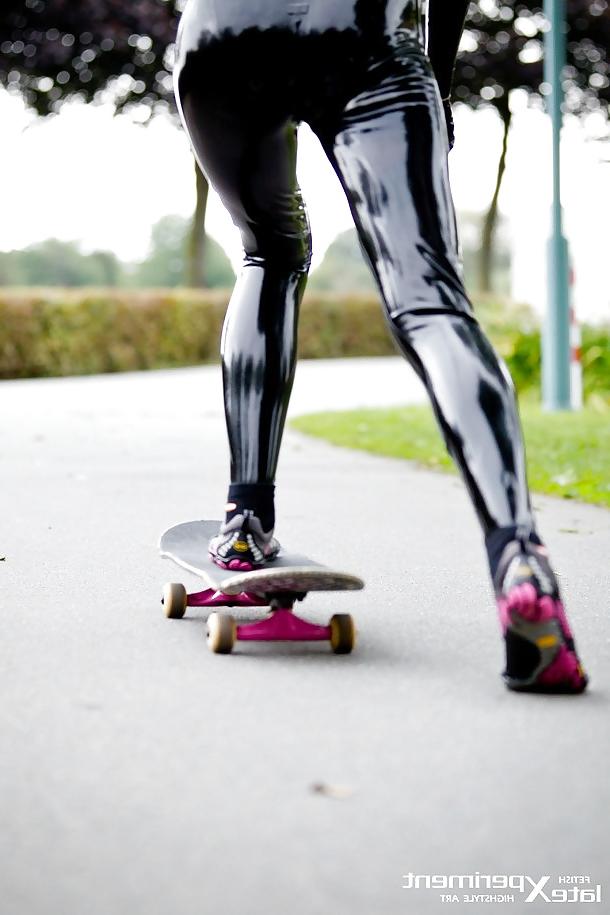 13P Blonde in Black Latex Skateboarding with Vibram Five Fingers