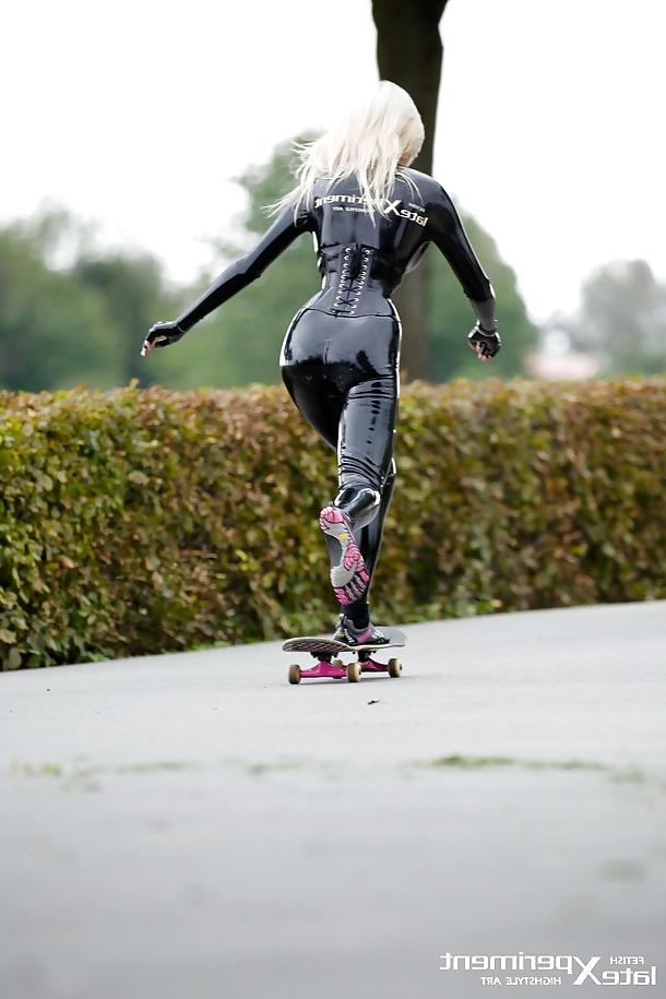13P Blonde in Black Latex Skateboarding with Vibram Five Fingers