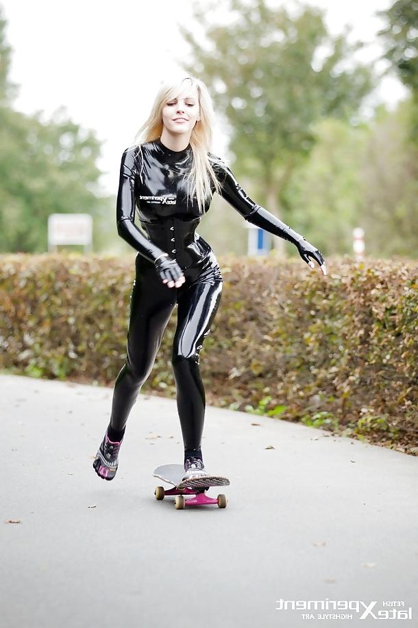 13P Blonde in Black Latex Skateboarding with Vibram Five Fingers