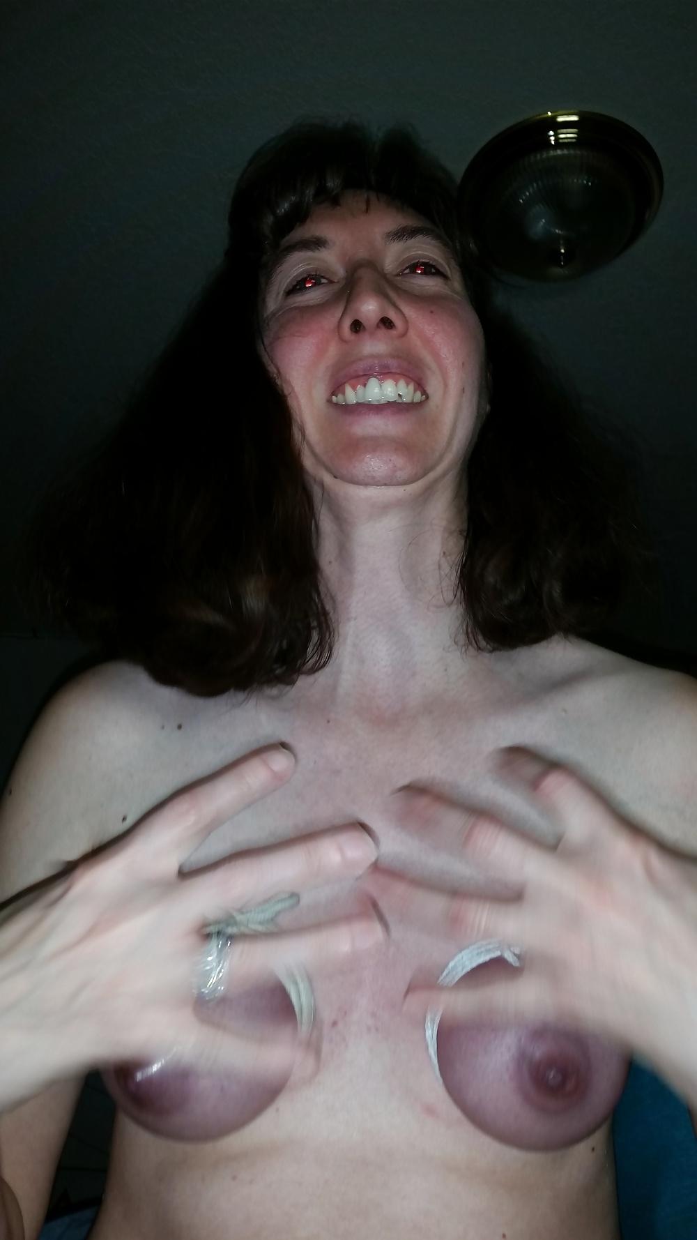 25P My wife's first time breast binding with weights.